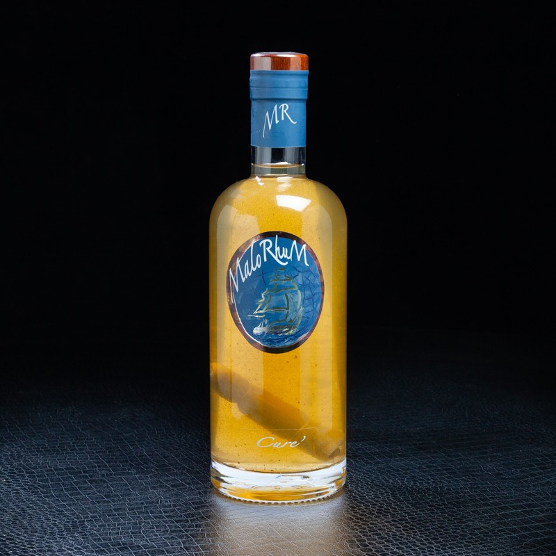 Boisson alcoolisée à base de Rhum Cure' Malorhum 35% 70cl  Rhums arangés